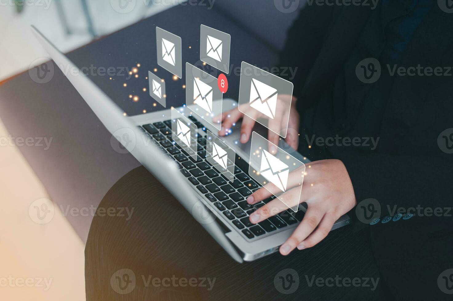 Businessman using a laptop with email notification concept for marketing and newsletter concept, Digital communication with email messages, Sending and receiving messages online with the email icon photo