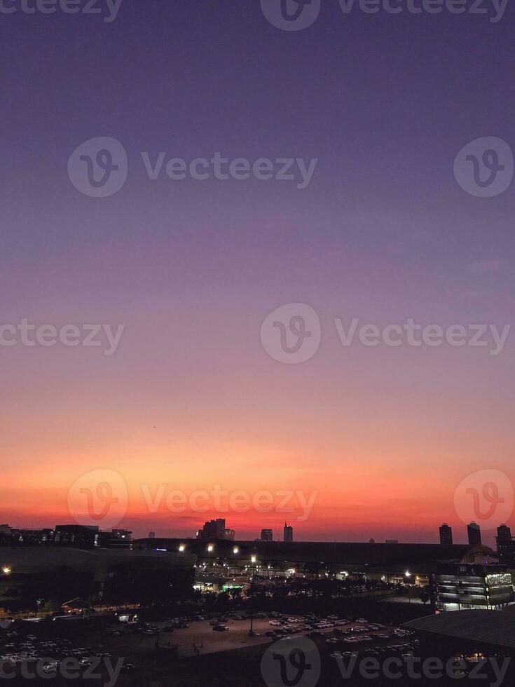 Urban sunset. Sky background photo