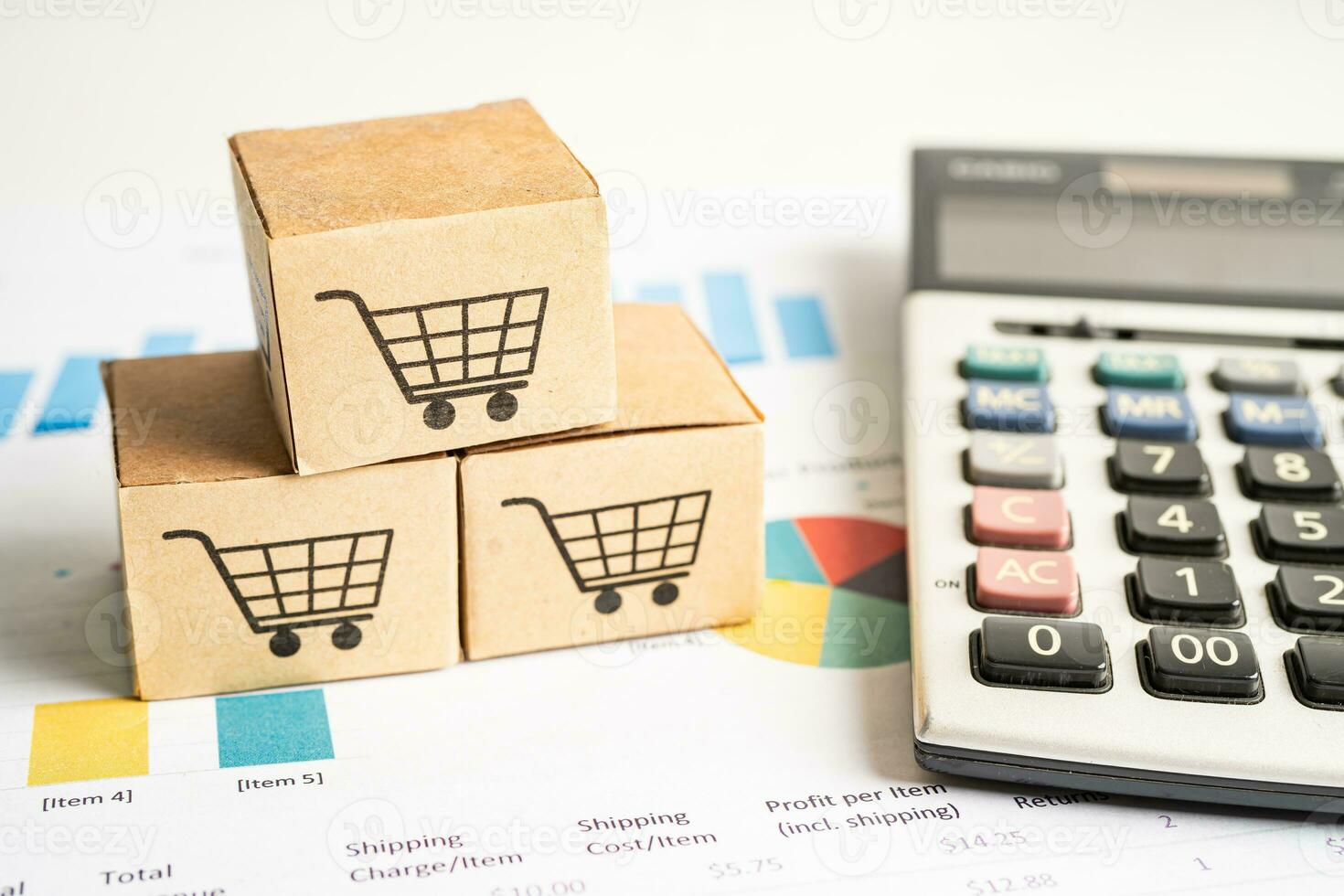 Shopping cart logo on box with magnifying glass on graph background. Banking Account, Investment Analytic research data economy, trading, Business import export transportation online company concept. photo