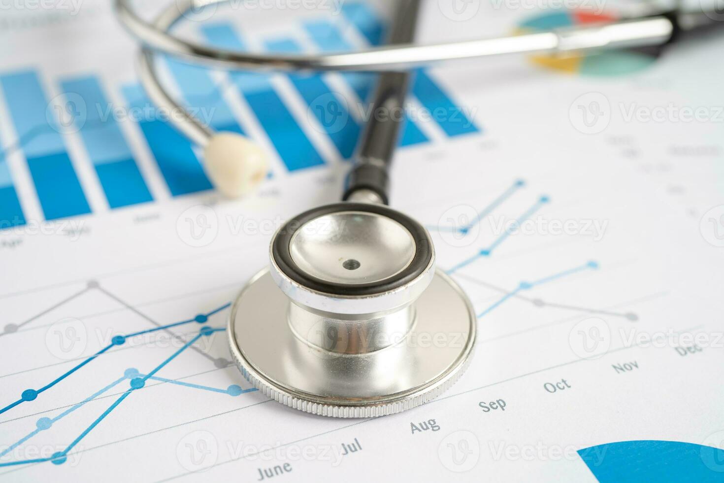 Stethoscope on graph paper, Finance, Account, Statistics, Investment, Analytic research data economy and Business company concept. photo