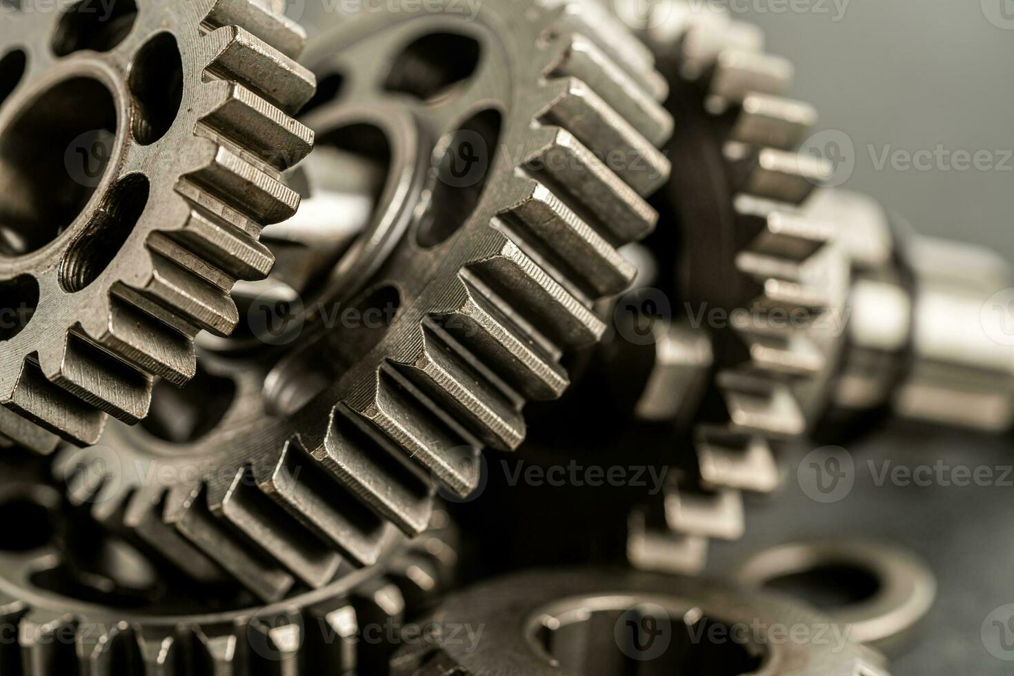 Gear and cogs wheels, clock mechanism, brass metal engine industrial. photo