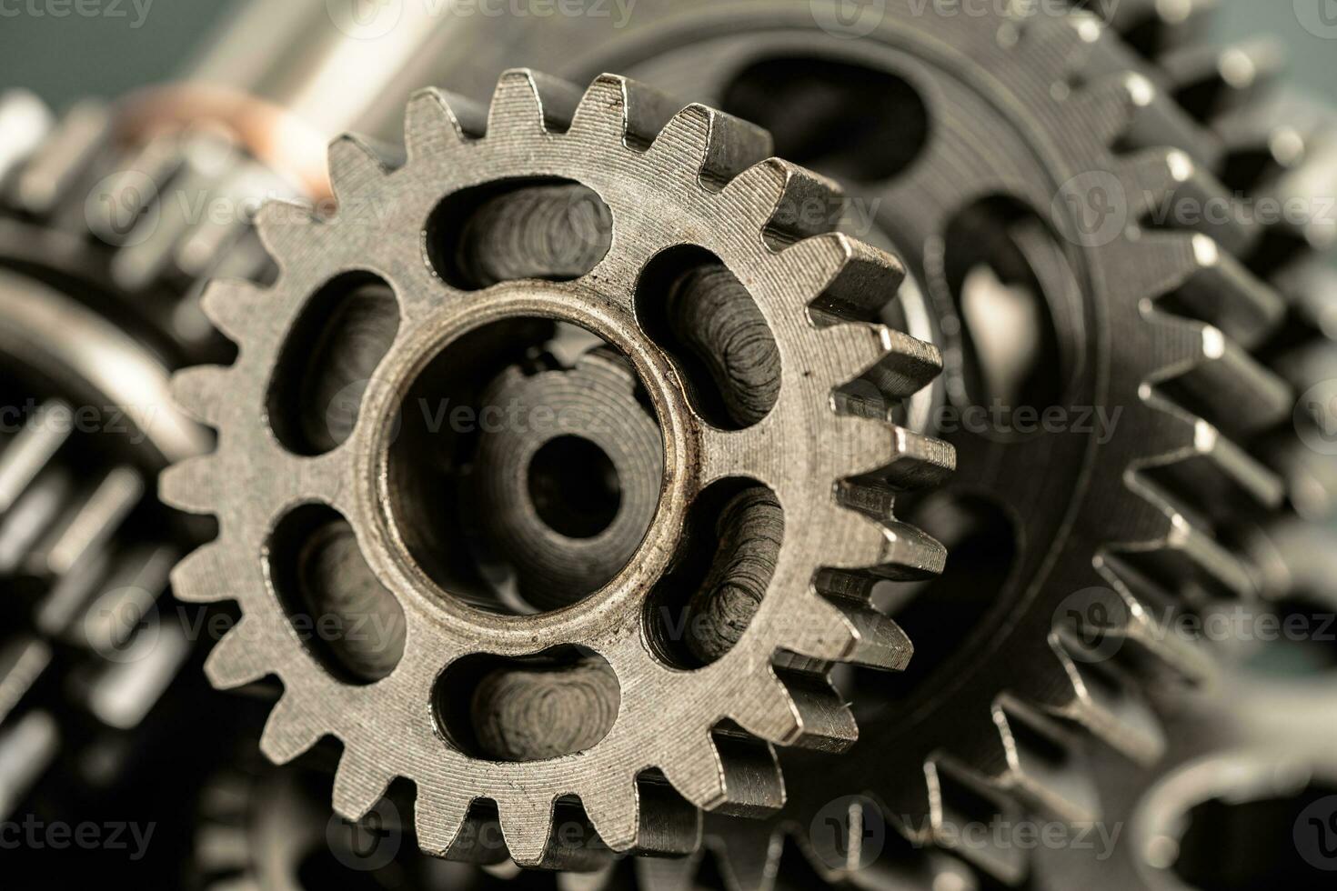 Gear and cogs wheels, clock mechanism, brass metal engine industrial. photo