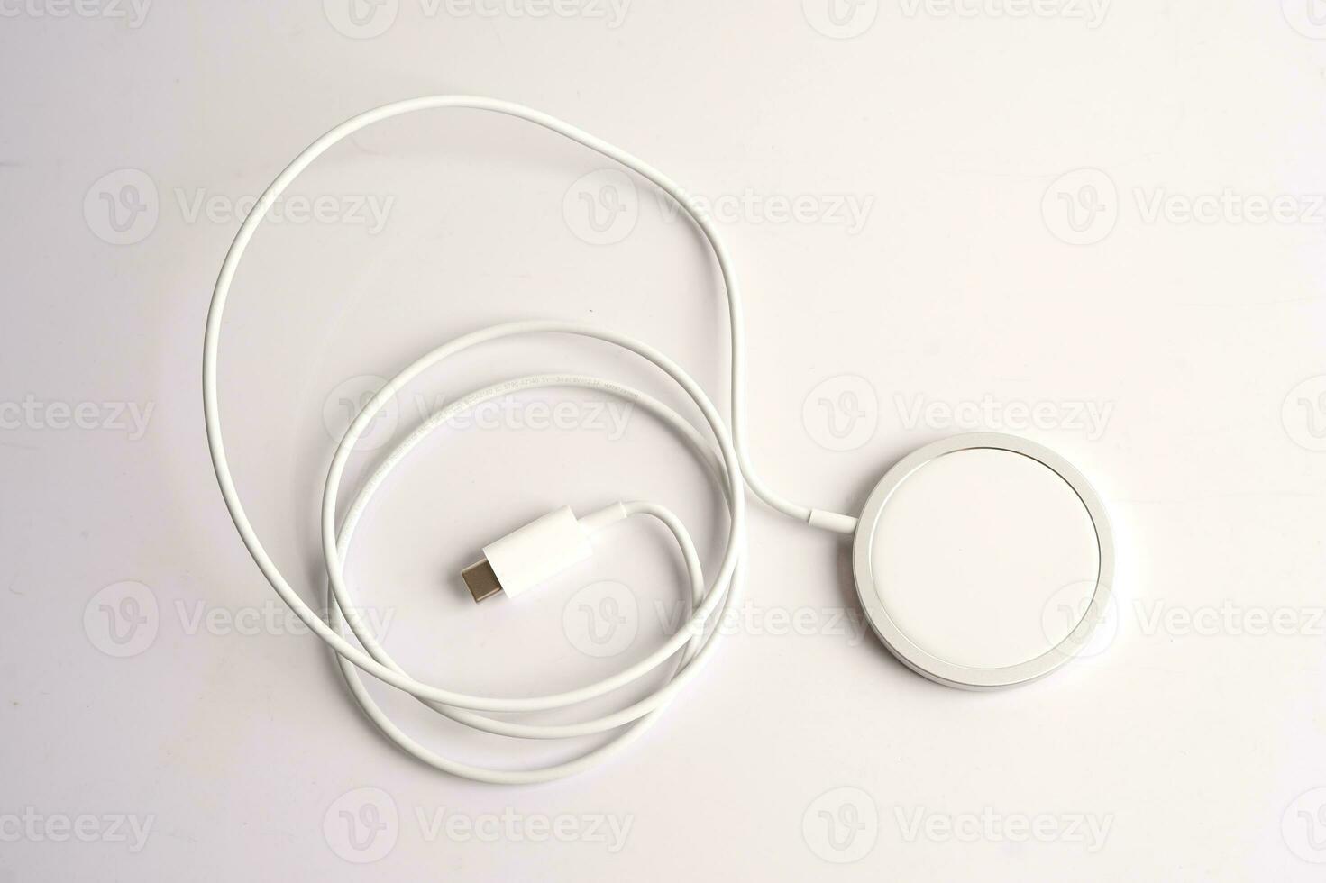 Wireless charger, magnetic charging modern equipment of mobile phone. photo