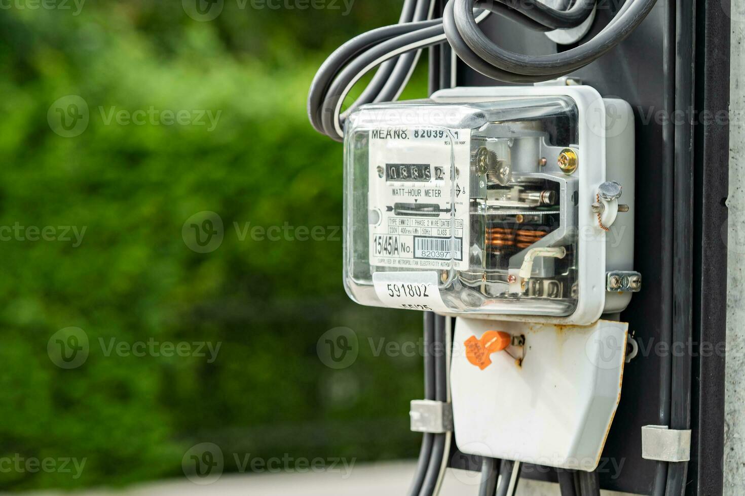 Electric measuring power meter for energy cost at home and office. photo