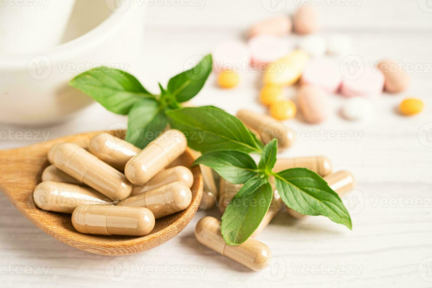 Alternative medicine herbal organic capsule with vitamin E omega 3 fish oil, mineral, drug with herbs leaf natural supplements for healthy good life. photo