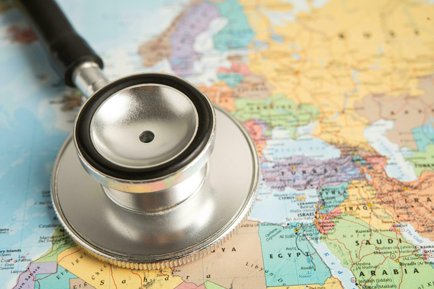 Bangkok, Thailand June 1, 2022, Stethoscope on Europe world globe map background. photo