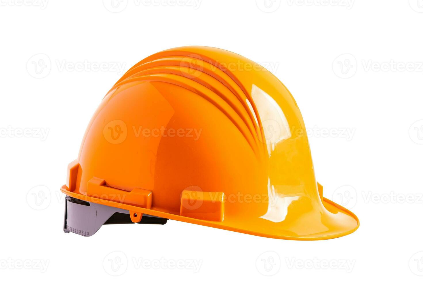 Orange construction helmet isolated on white background with clipping path, engineer safety concept. photo