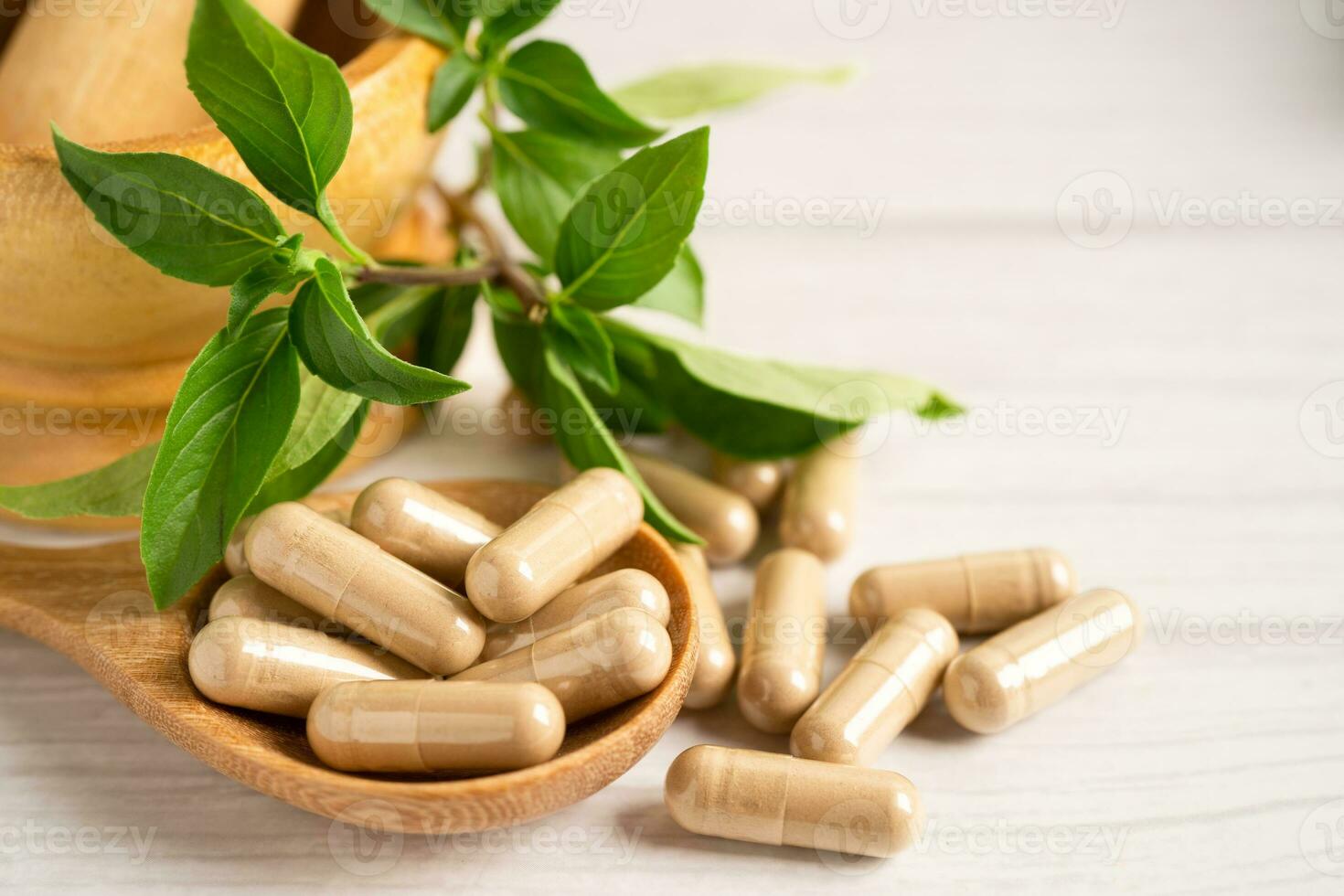 Alternative medicine herbal organic capsule with vitamin E omega 3 fish oil, mineral, drug with herbs leaf natural supplements for healthy good life. photo