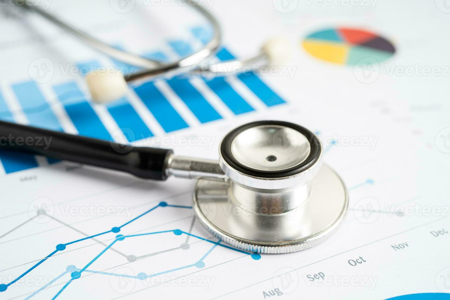 Stethoscope on graph paper, Finance, Account, Statistics, Investment, Analytic research data economy and Business company concept. photo