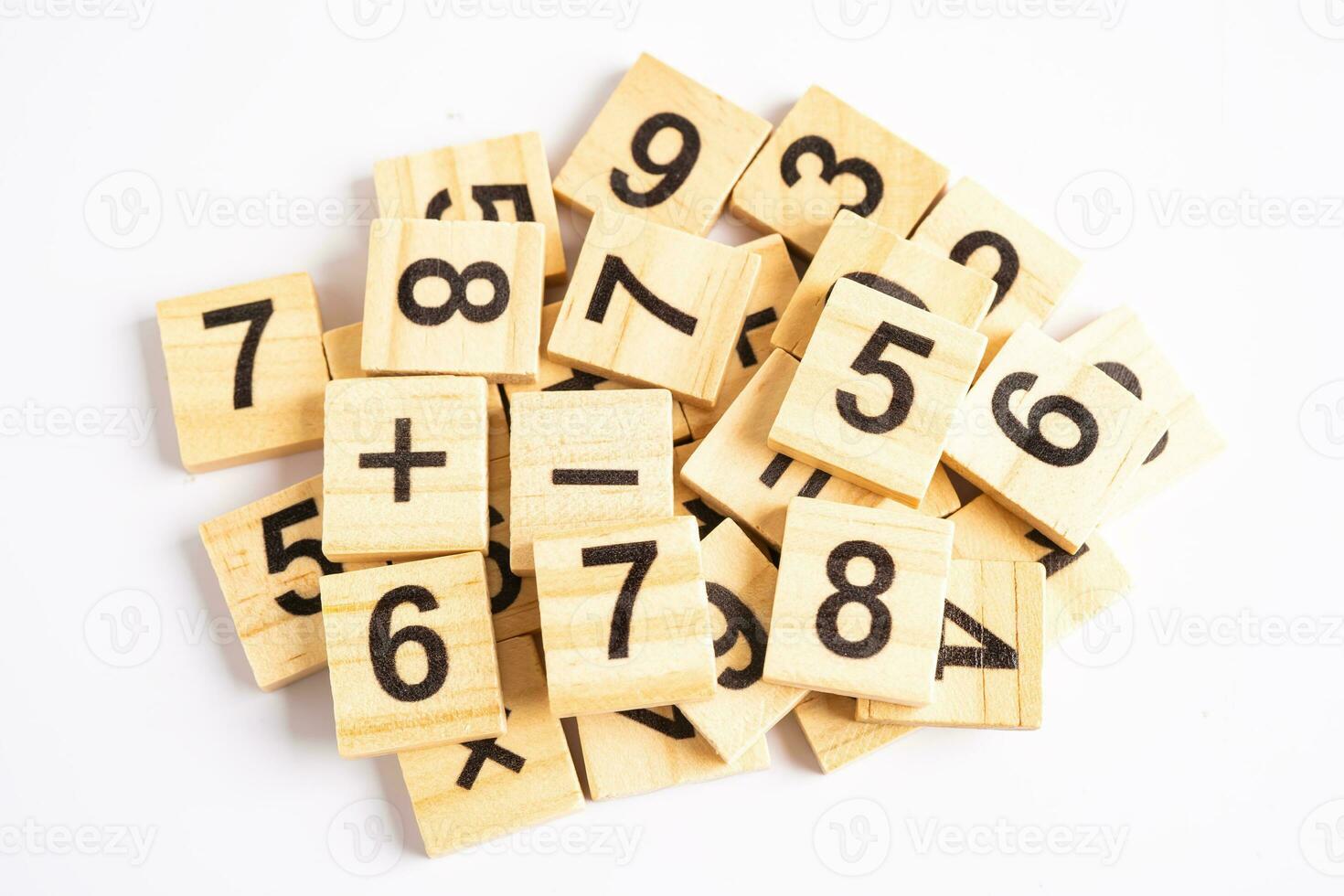 Math number wooden on white background, education study mathematics learning teach concept. photo