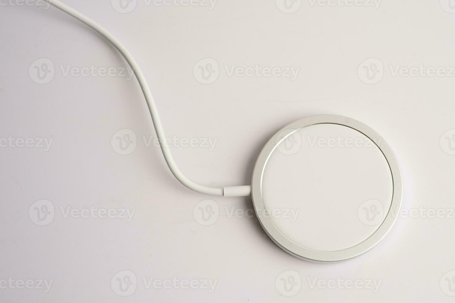 Wireless charger, magnetic charging modern equipment of mobile phone. photo
