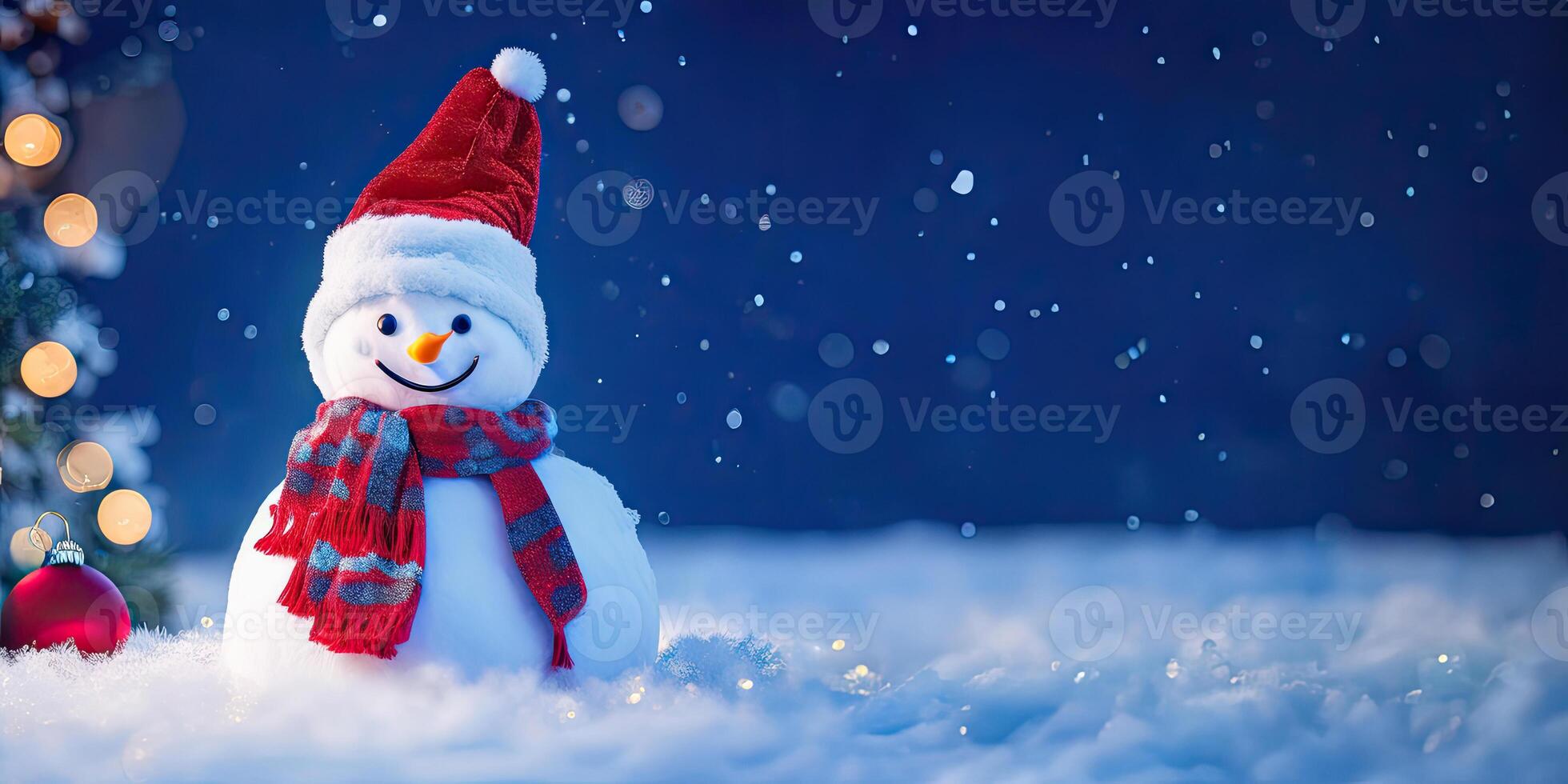 The snowman with red hat and scarf is standing in the snow,. photo
