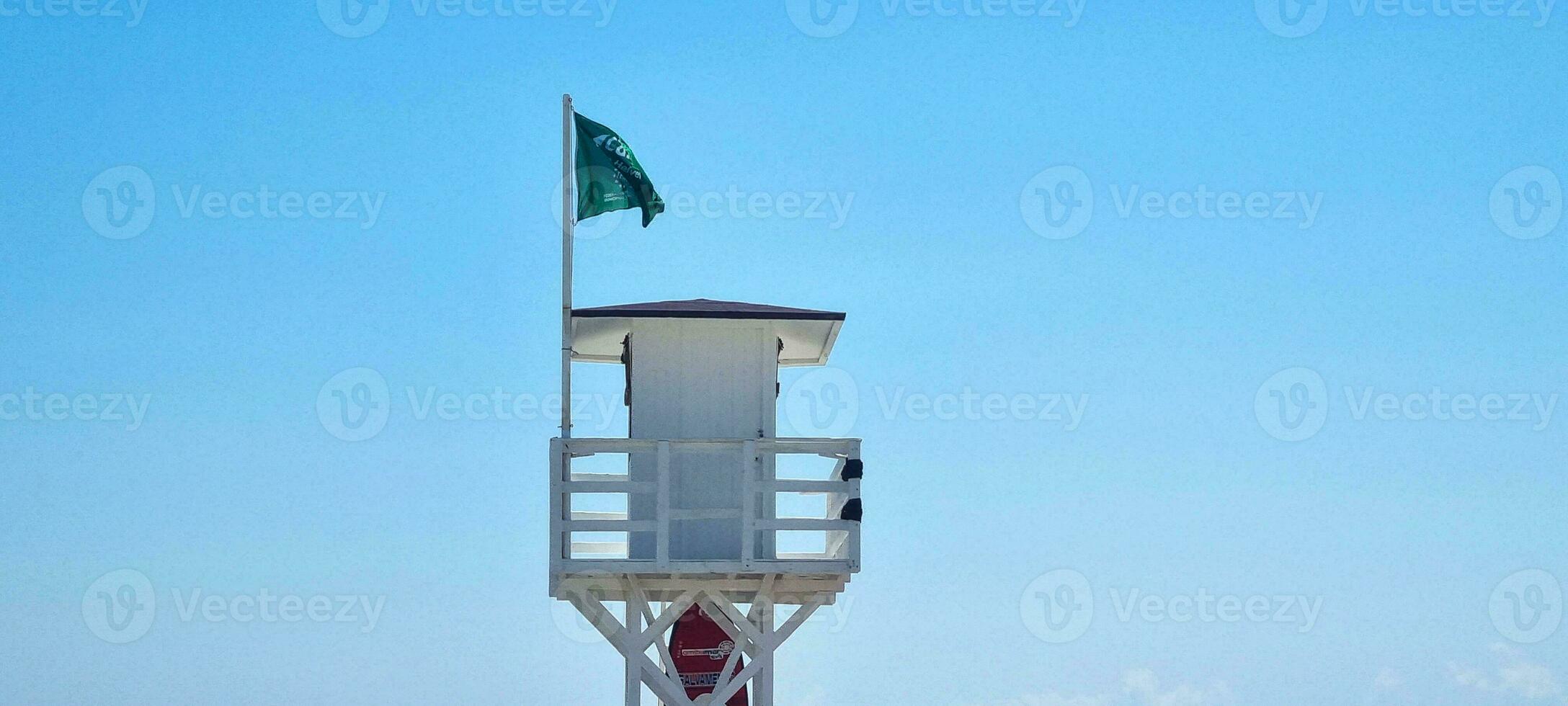 Lifeguard watchtower on the sea coast photo