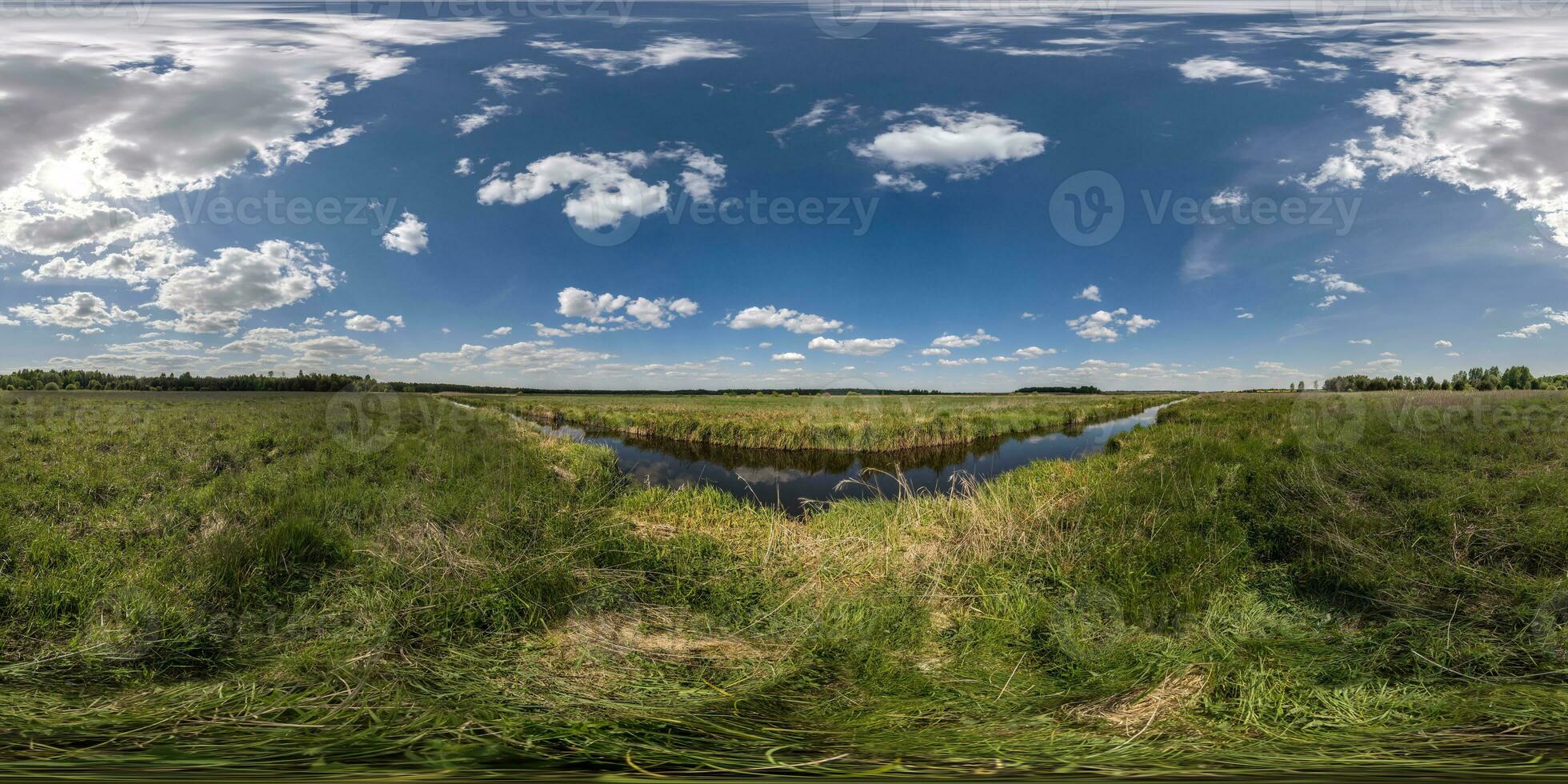 spherical 360 hdri panorama among green grass farming field near melioration reclamation canal in equirectangular seamless projection, as sky dome replacement, game development as skybox or VR content photo