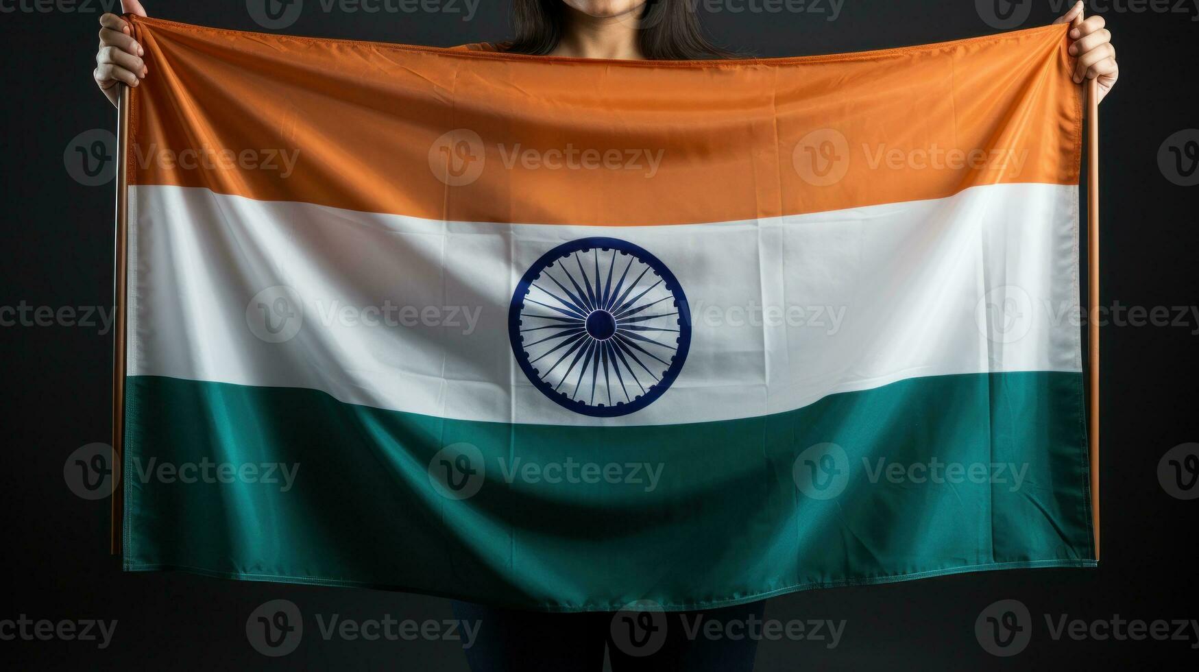 Hand holding India flag photo