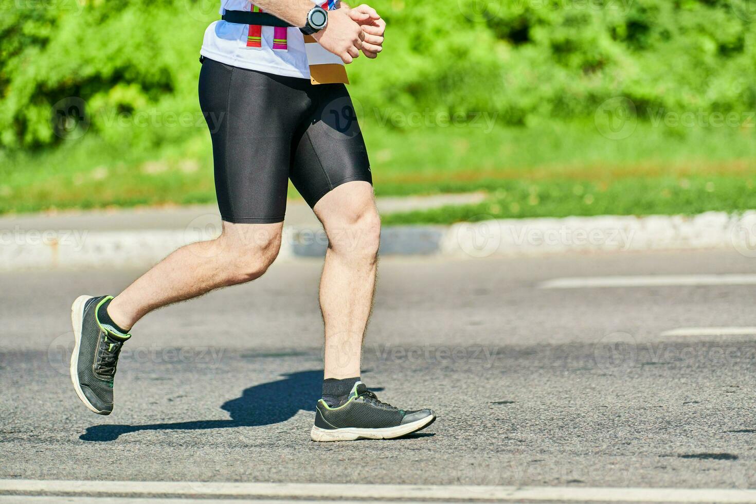 Running man on road photo