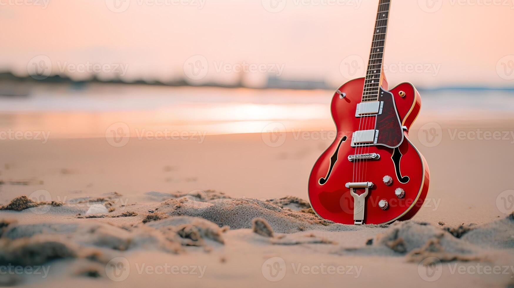 Red Guitar on the Beach photo