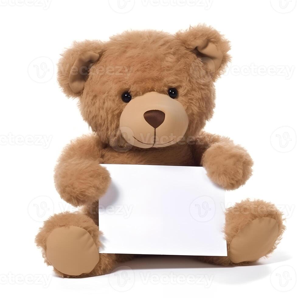 Brown Teddy Bear sitting on a White Background with a Blank Piece photo