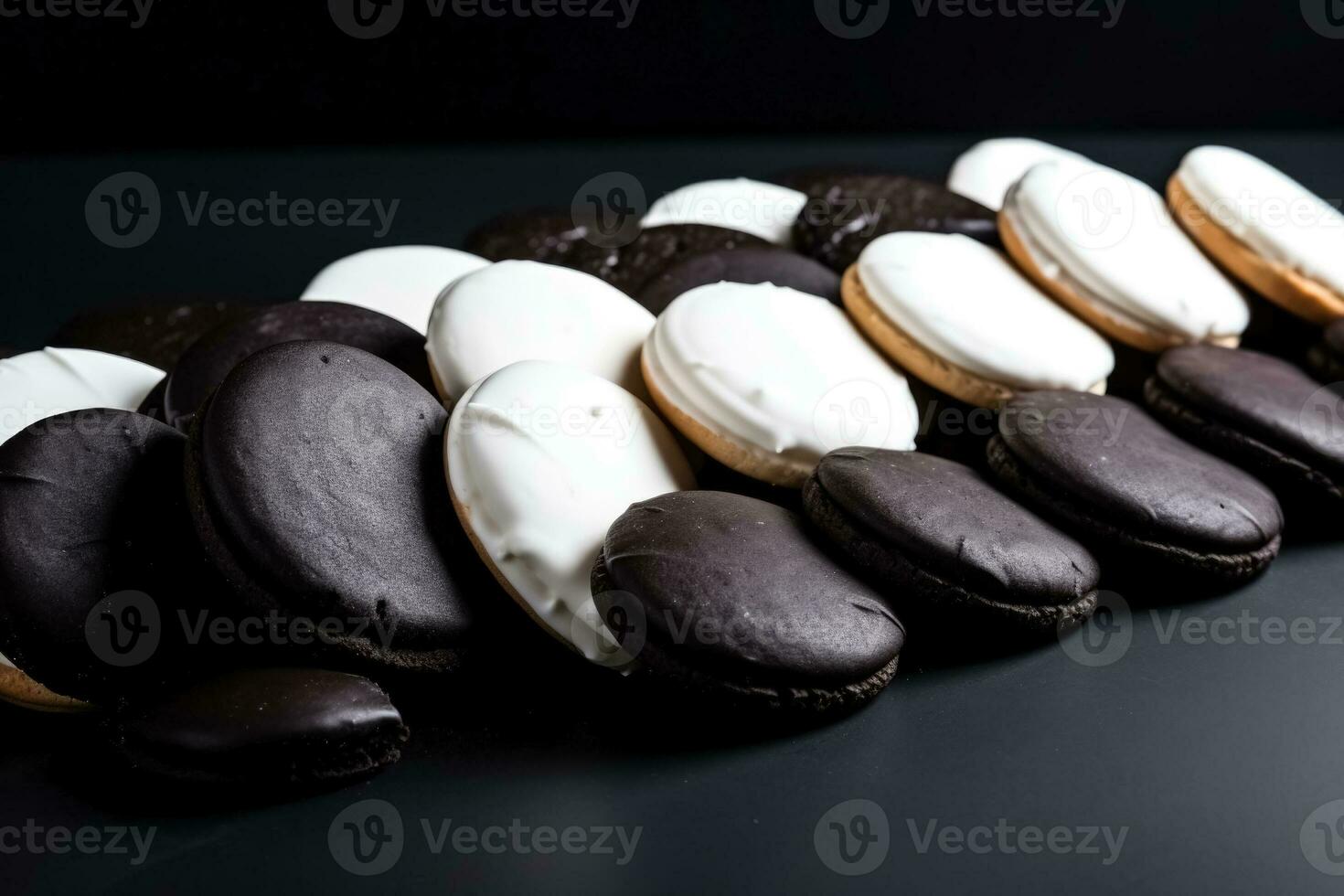 Delicious Black and White Cookies dark background with empty space for text photo