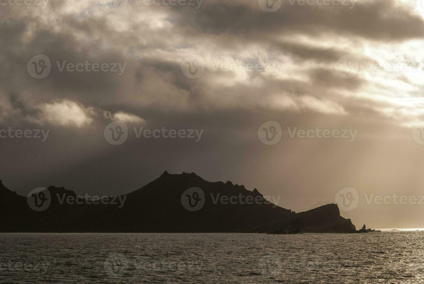 Sunset over Antarctica sea photo