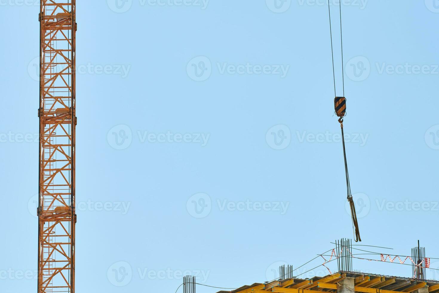 Construction crane working on building complex 26519110 Stock Photo at
