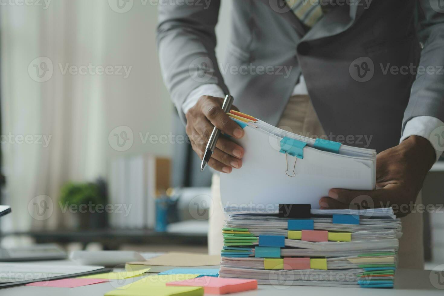 Financial analysts analyze business financial reports on a digital tablet planning investment project during a discussion at a meeting of corporate showing the results of their successful teamwork. photo