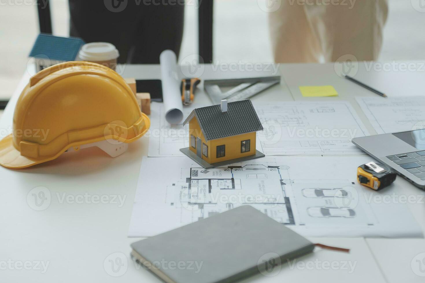Construction and structure concept of Engineer or architect meeting for project working with partner and engineering tools on model building and blueprint in working site, contract for both companies. photo