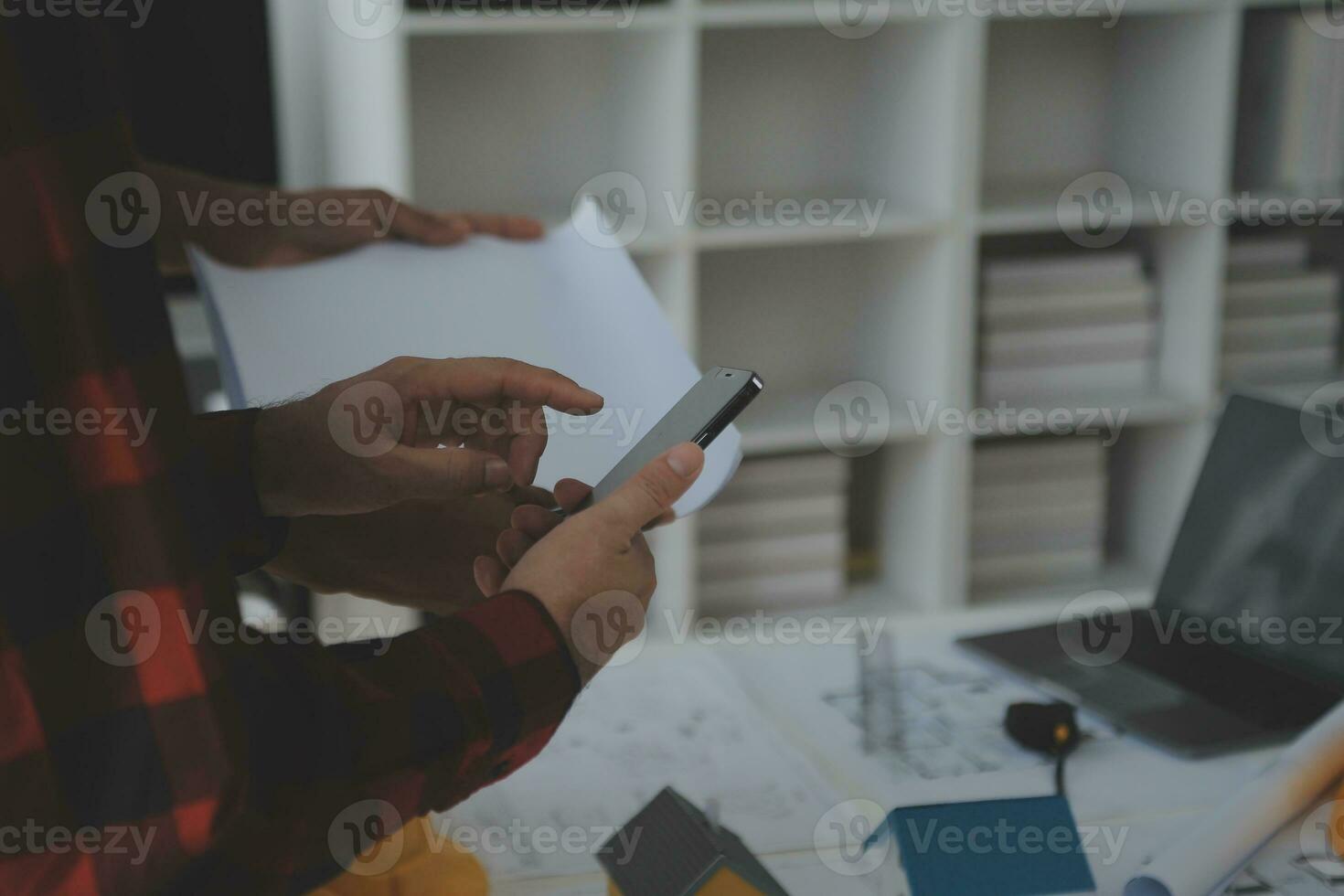 Construction and structure concept of Engineer or architect meeting for project working with partner and engineering tools on model building and blueprint in working site, contract for both companies. photo