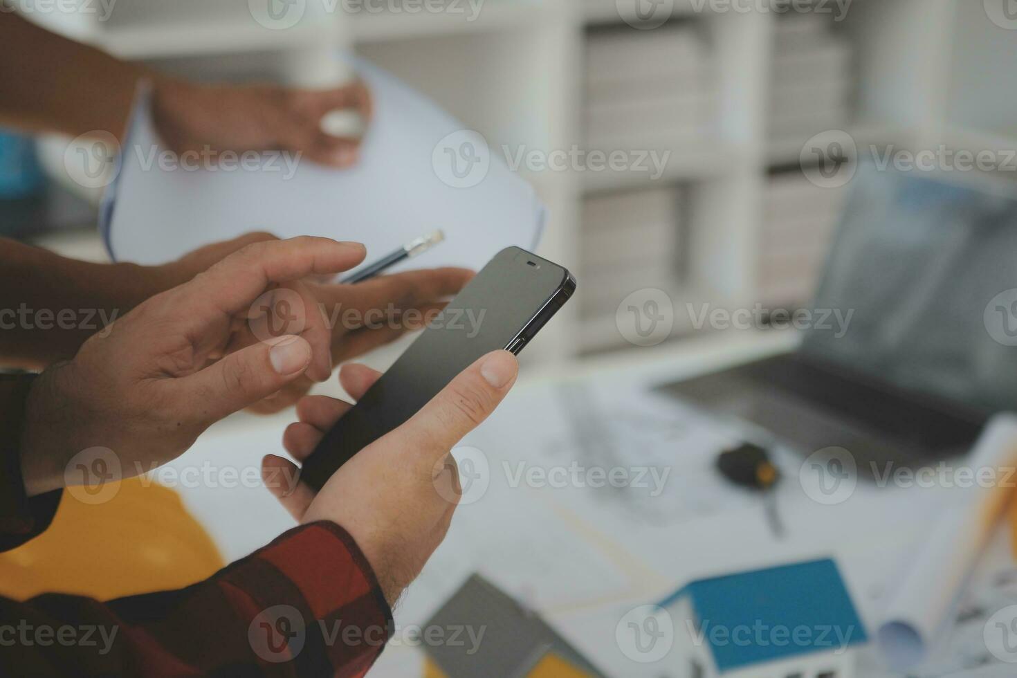 Construction and structure concept of Engineer or architect meeting for project working with partner and engineering tools on model building and blueprint in working site, contract for both companies. photo