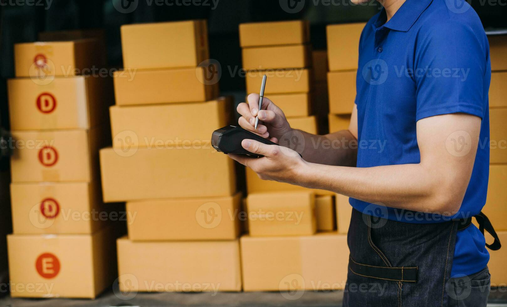 Starting small businesses SME owners female entrepreneurs Write the address on receipt box and check online orders to prepare to pack the boxes, sell to customers, sme business ideas online. photo