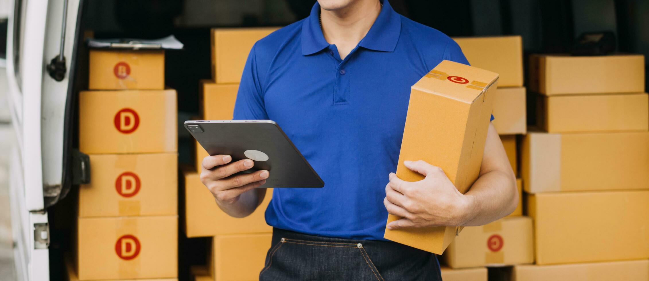 Business woman start up small business entrepreneur SME success .freelance woman working at home with Online Parcel delivery. SME and packaging deliveryconcept photo