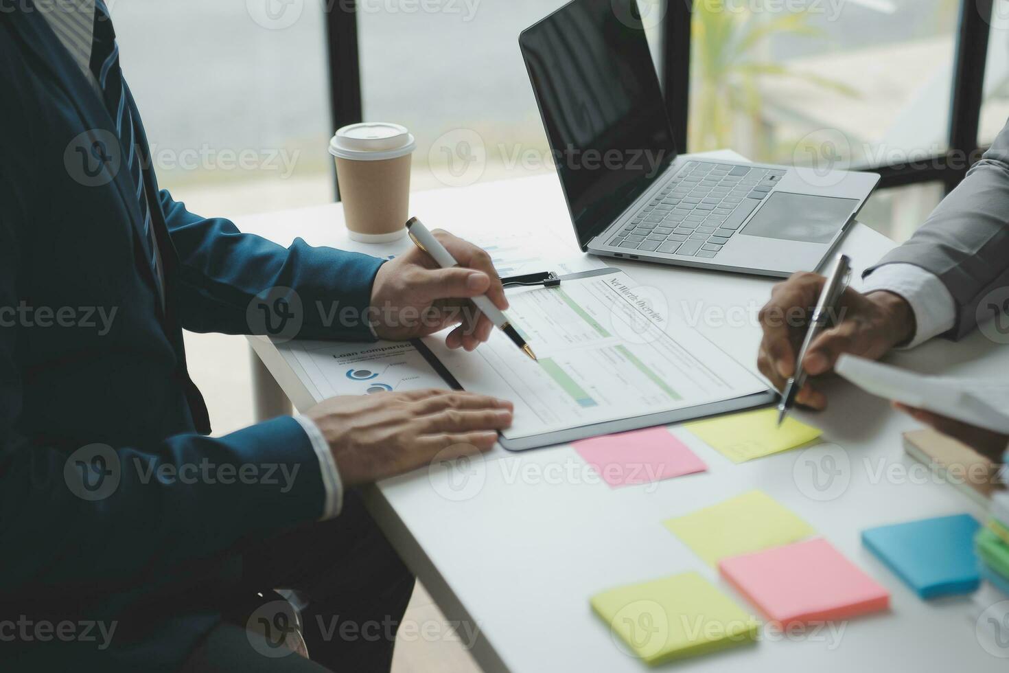 Audit concept,Administrator business man financial inspector and secretary making report calculating balance. Internal Revenue Service checking document. photo