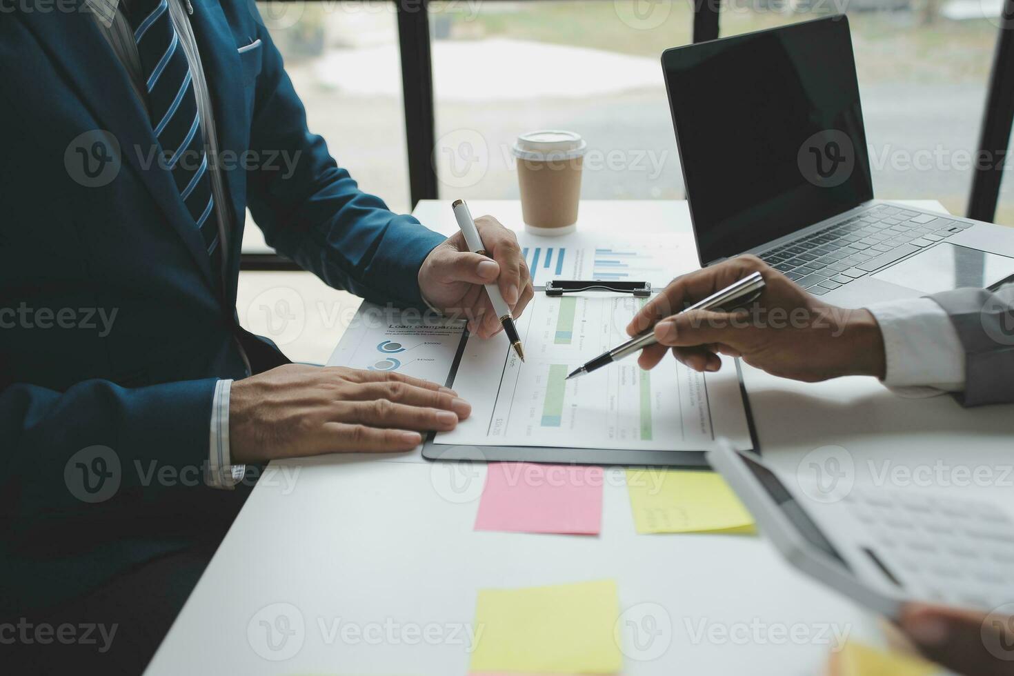 Audit concept,Administrator business man financial inspector and secretary making report calculating balance. Internal Revenue Service checking document. photo