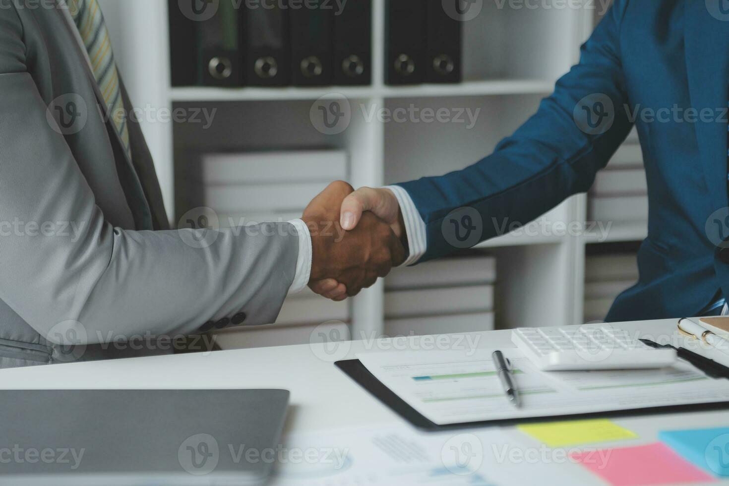 Audit concept,Administrator business man financial inspector and secretary making report calculating balance. Internal Revenue Service checking document. photo
