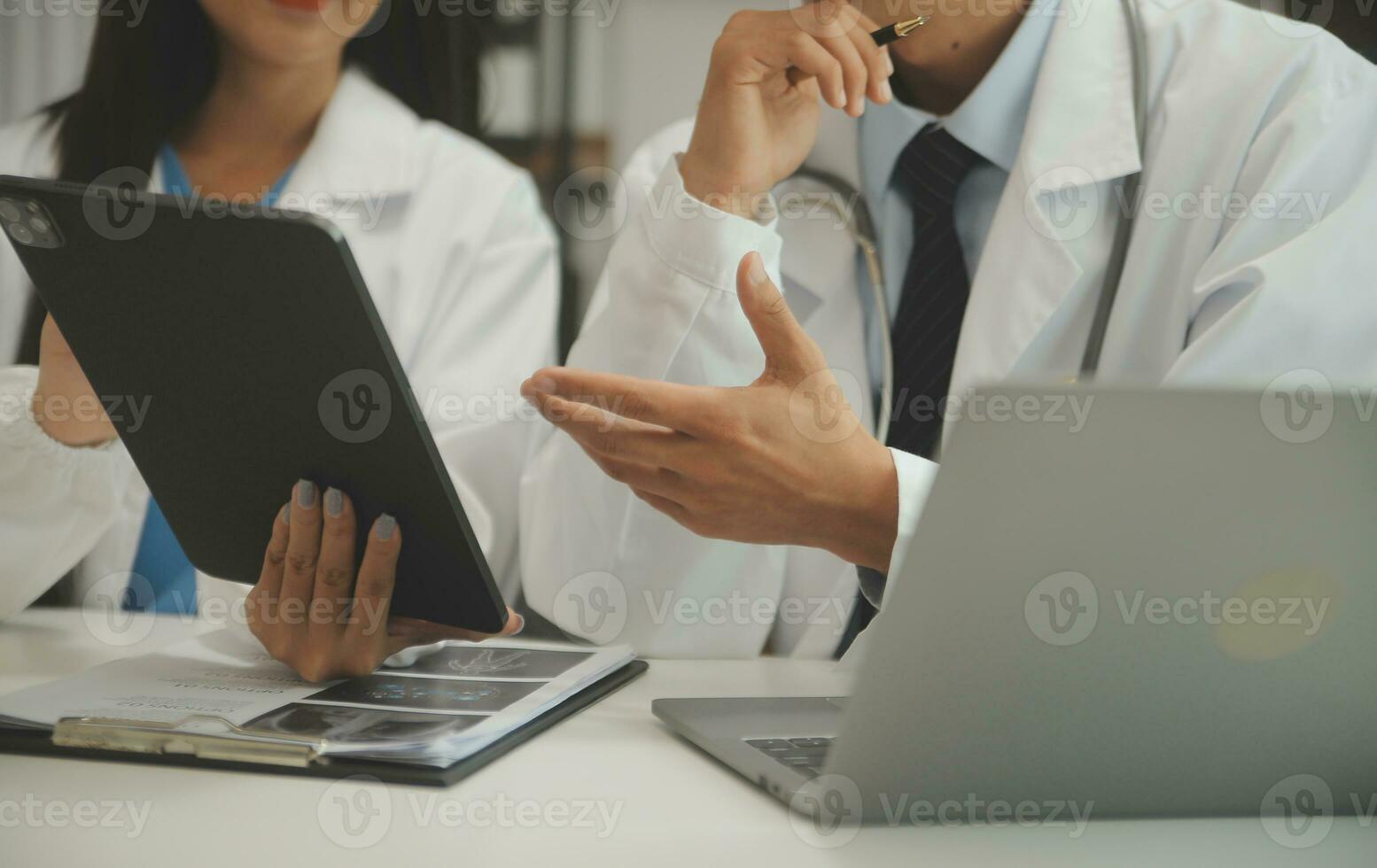 Doctor who records a patient's detailed information or medication history is evaluating medications and vaccines for the intended treatment. or if there are any side effects. photo