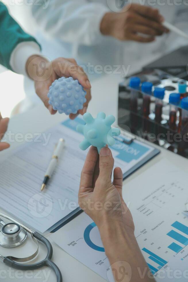 Cropped image of successful medical doctors discussing diagnosis during the conference photo