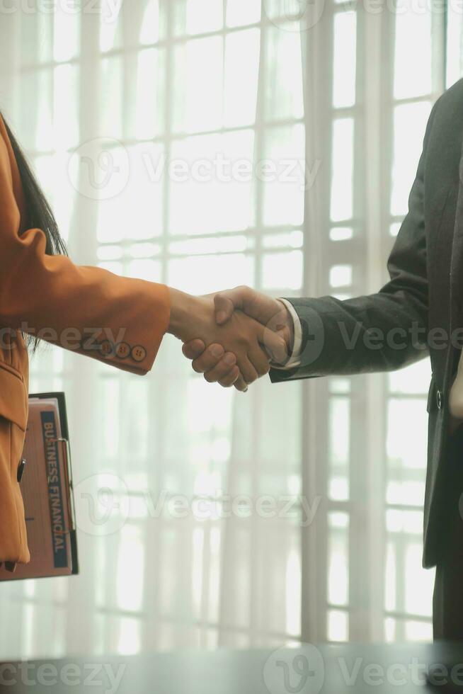 Business handshake for teamwork of business merger and acquisition,successful negotiate,hand shake,two businessman shake hand with partner to celebration partnership and business deal concept photo