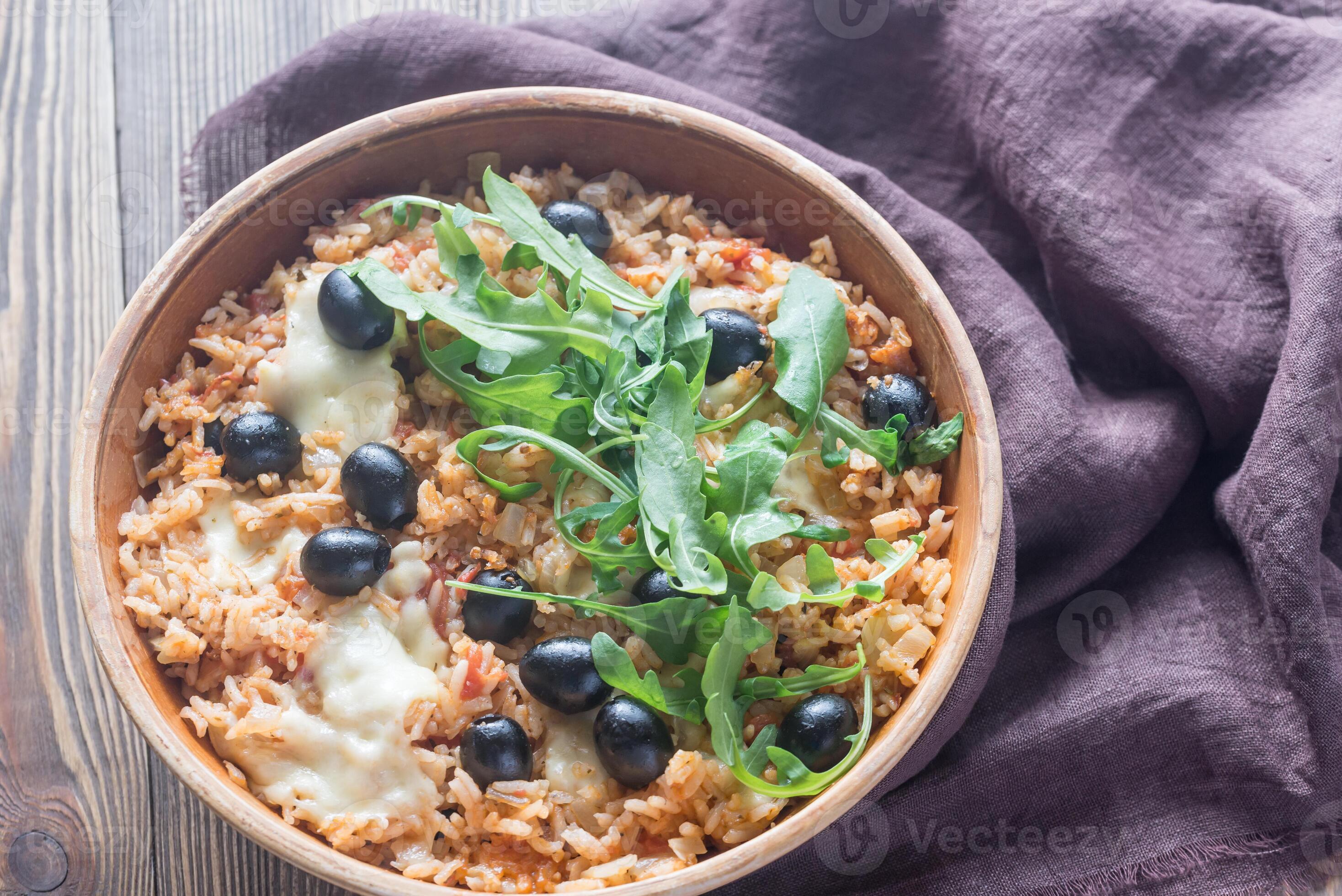 Bowl of tomato, olive and mozzarella rice 26522594 Stock Photo at Vecteezy