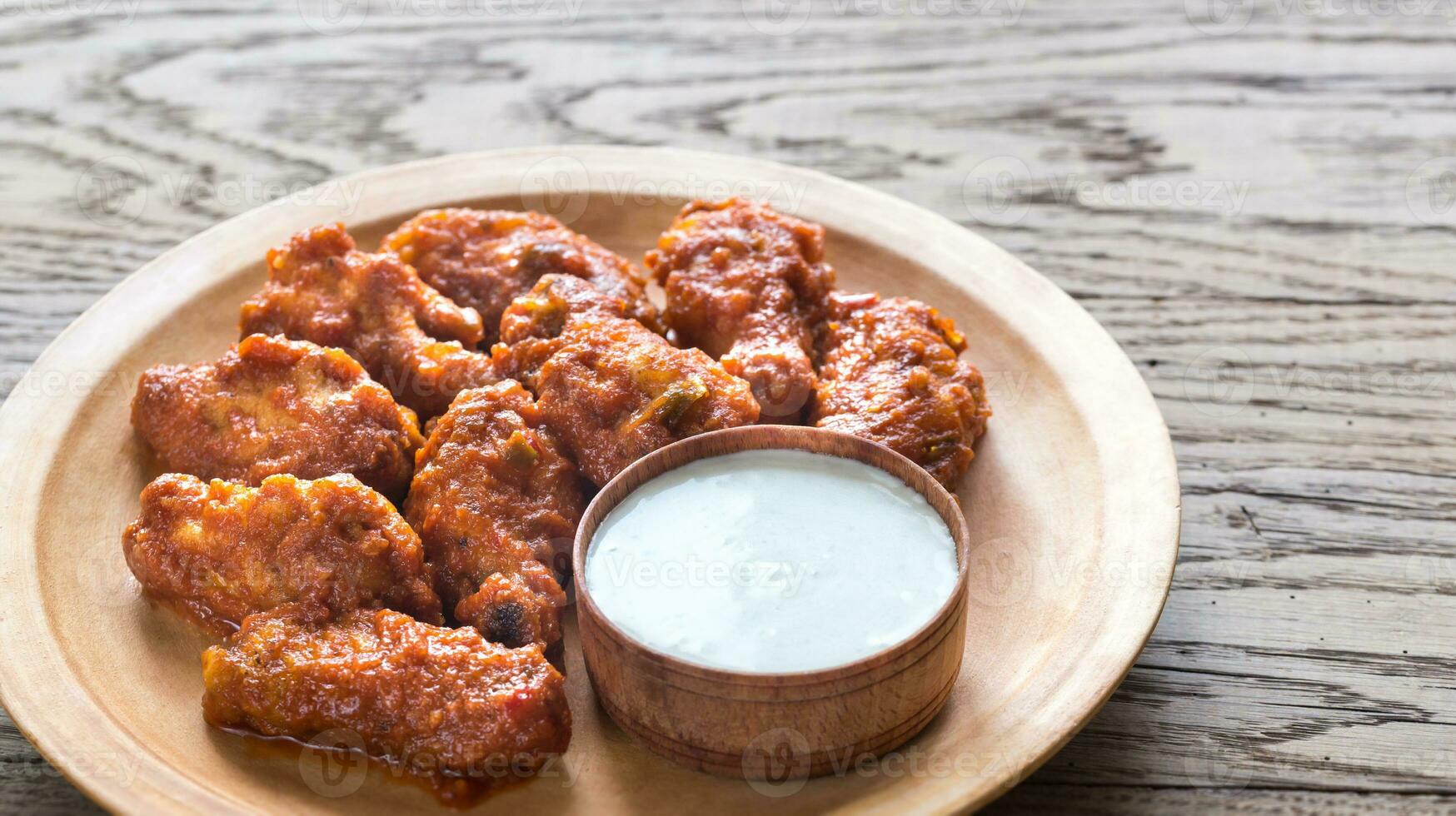 Fried chicken wings with blue cheese sauce photo