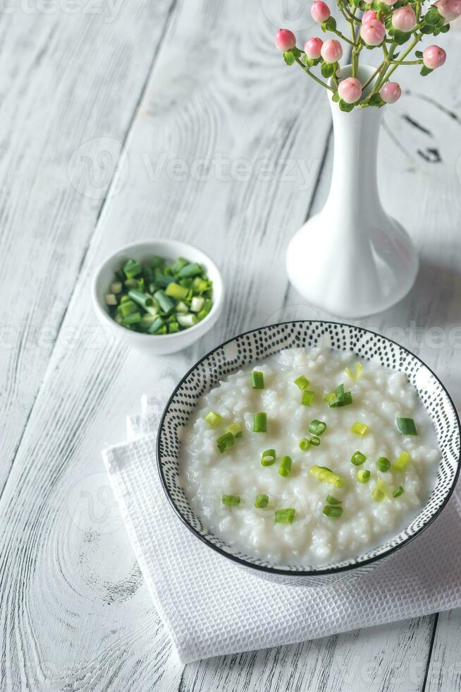 Bowl of congee - Asian rice porridge photo