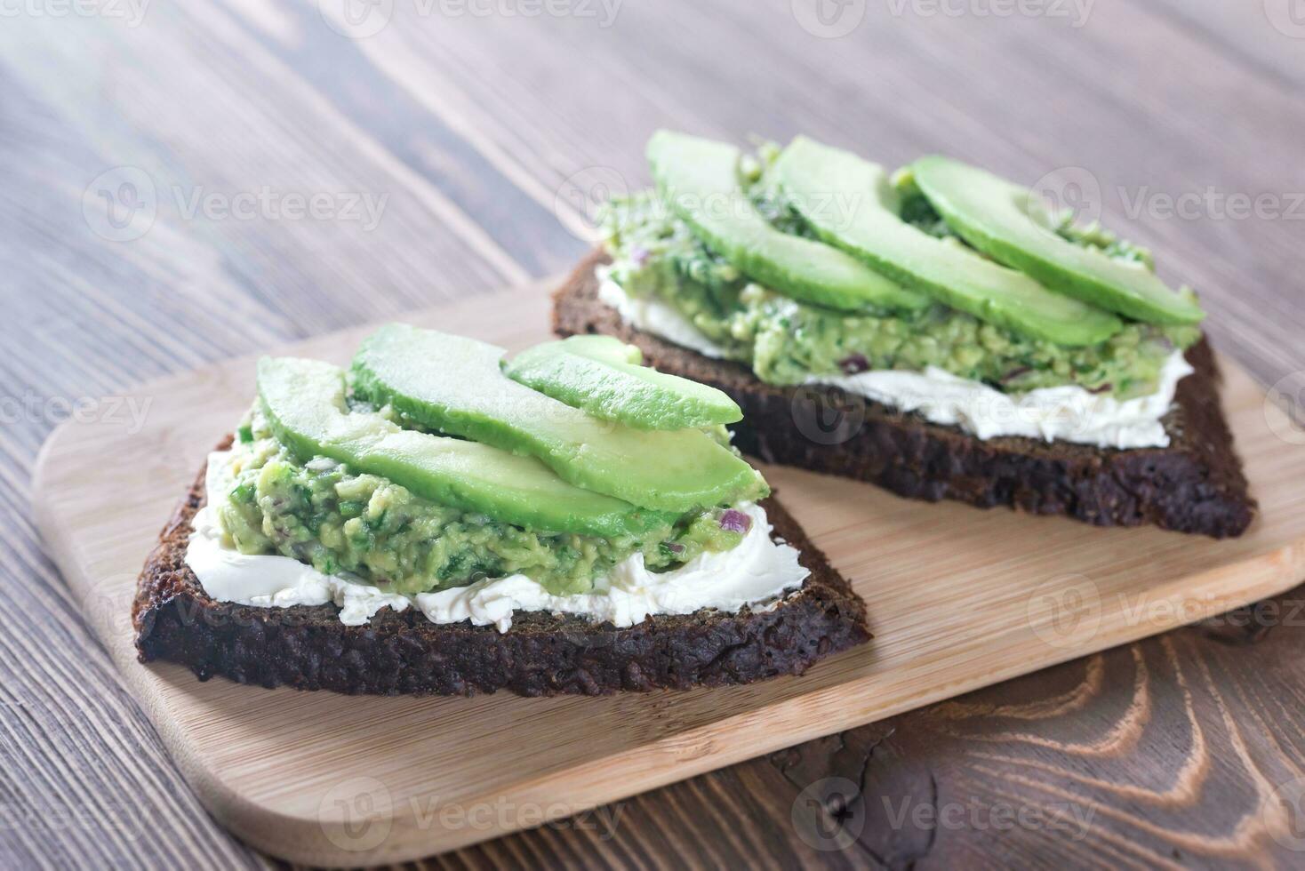 Toasts with cream cheese and guacamole photo