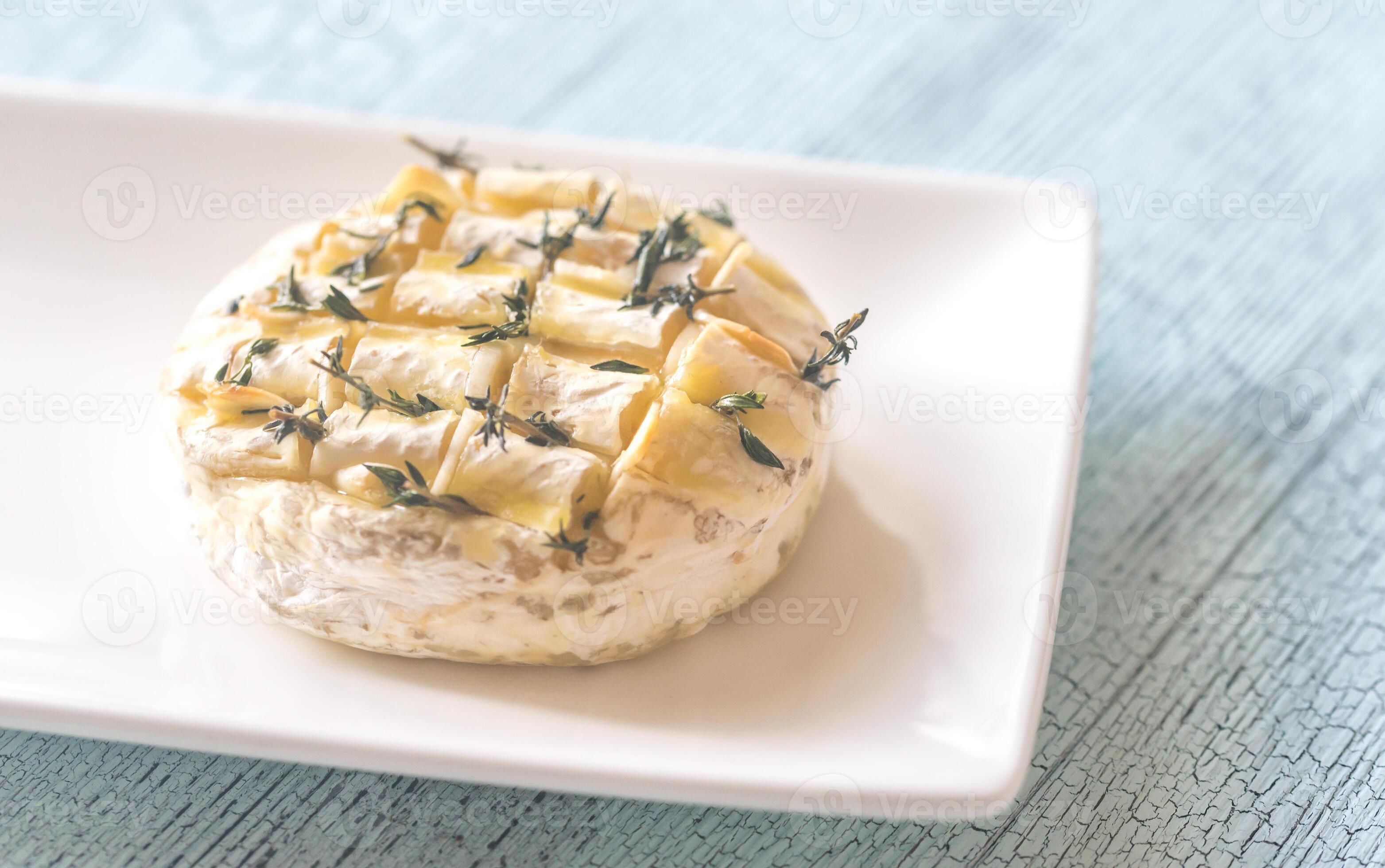 Camembert cheese fondue 26522901 Stock Photo at Vecteezy