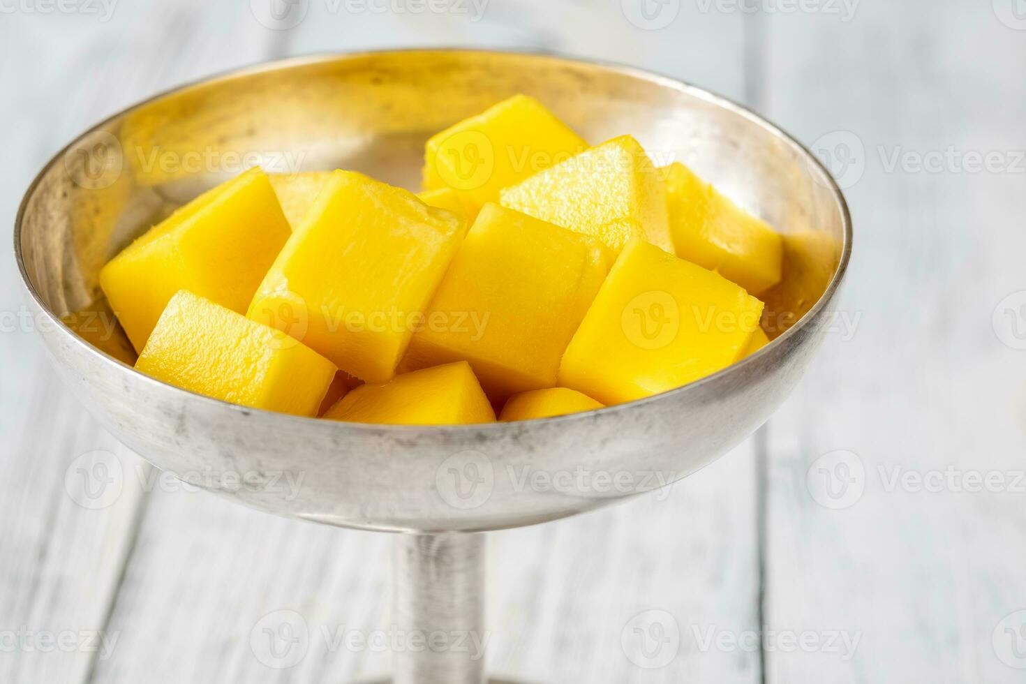 Fresh mango cubes photo