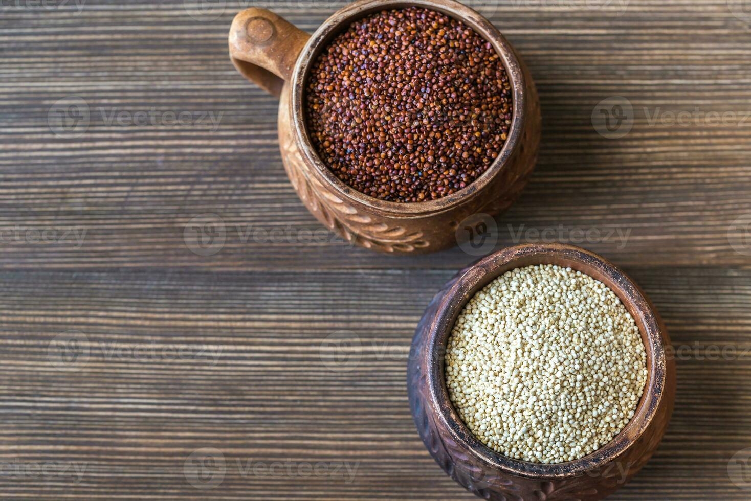 Bowls of white and red quinoa photo