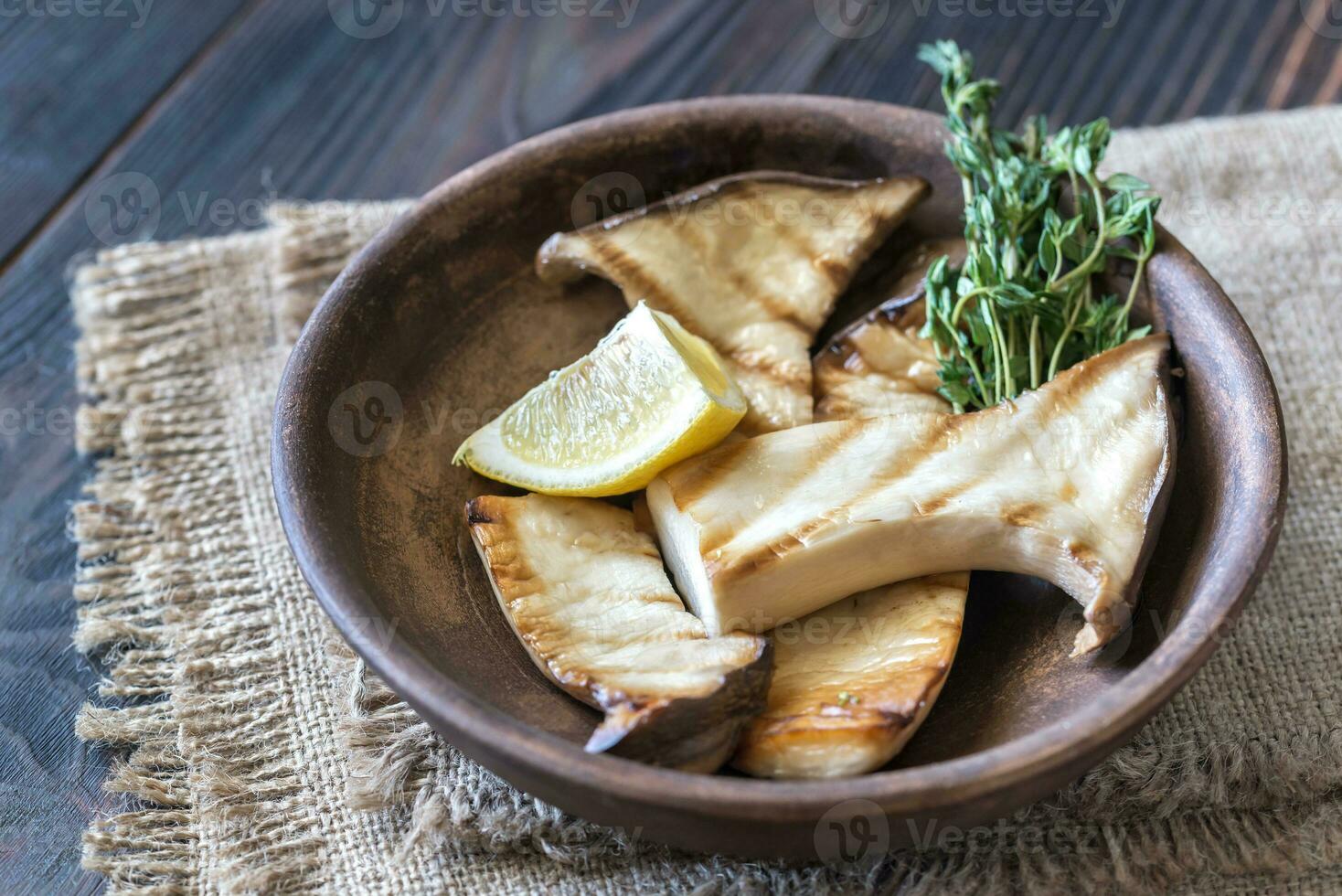 Bowl of grilled king oyster mushrooms photo