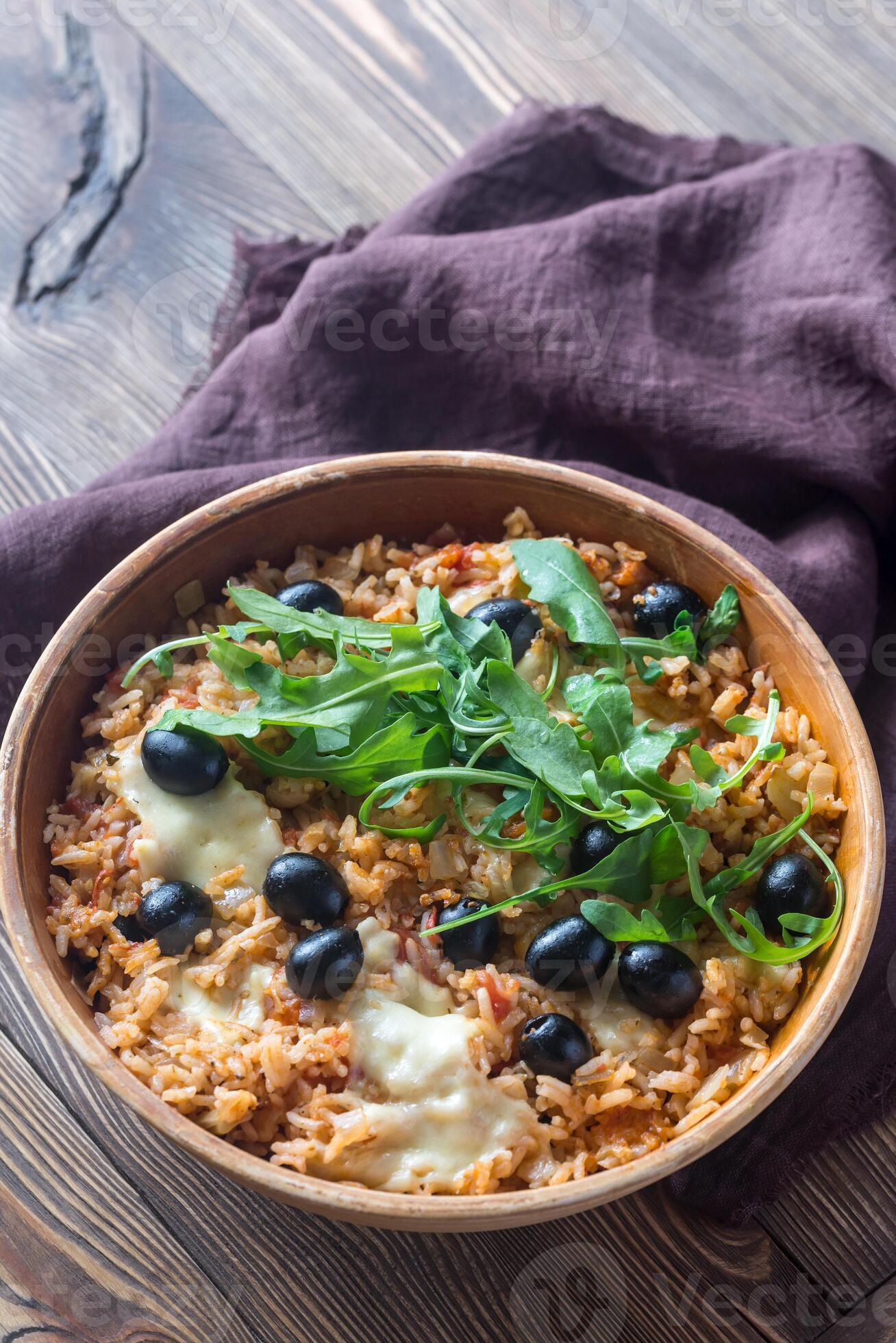 Bowl of tomato, olive and mozzarella rice 26523660 Stock Photo at Vecteezy