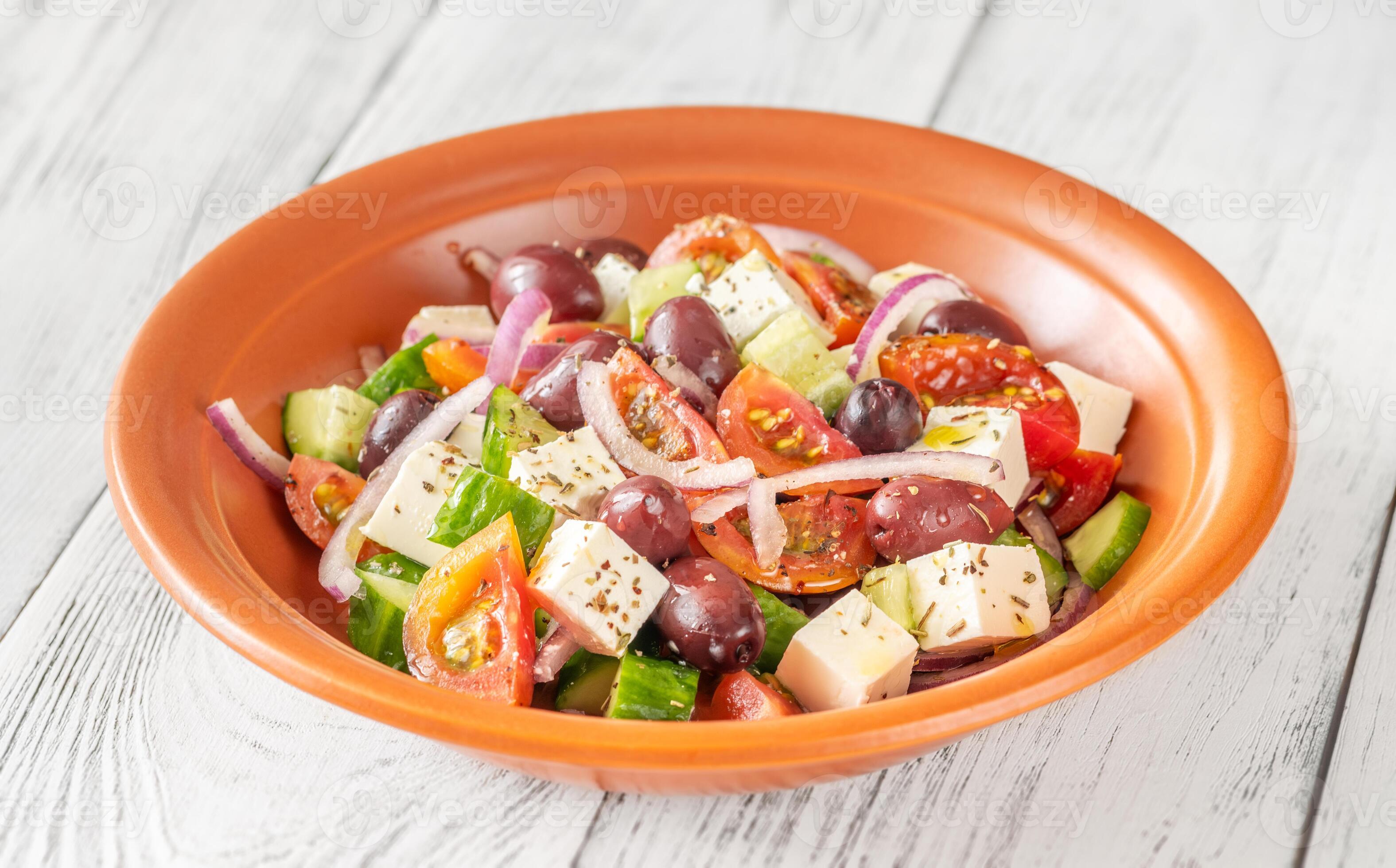 Bowl of Greek salad 26523680 Stock Photo at Vecteezy