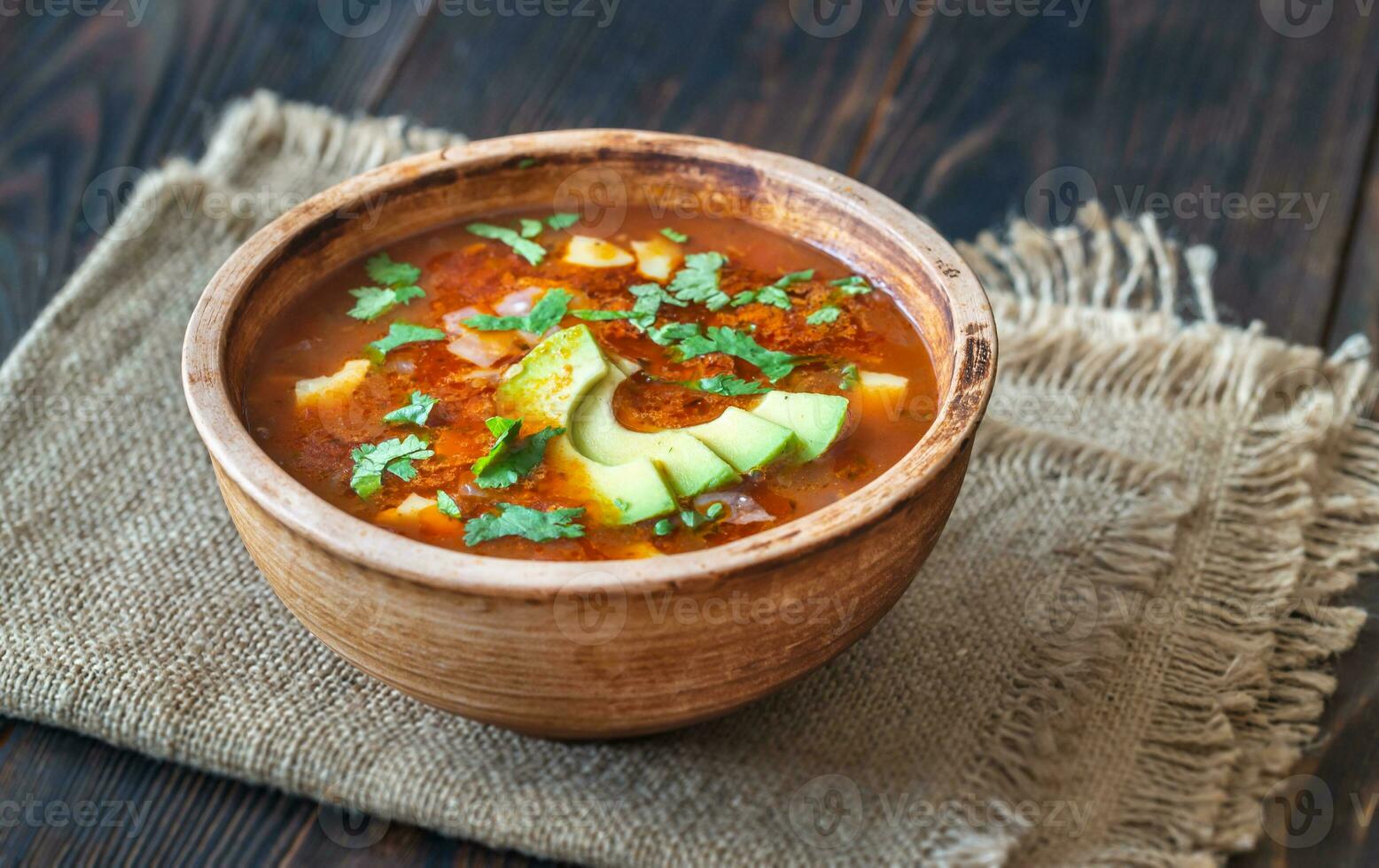 Bowl of spicy Mexican soup photo