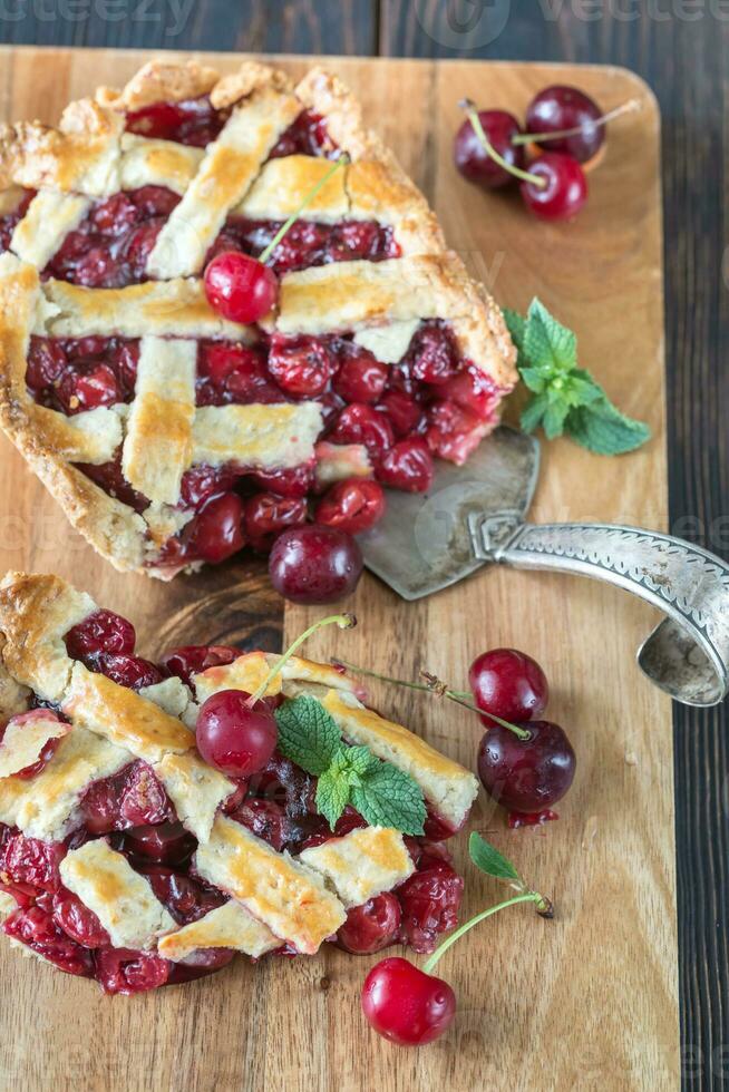 Cherry pie on the wooden board photo