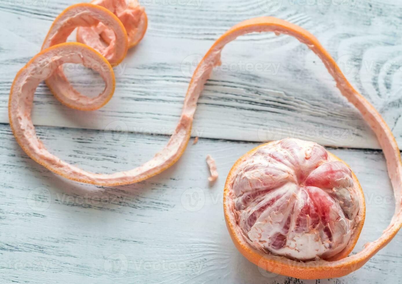 Peeled grapefruit flat lay photo
